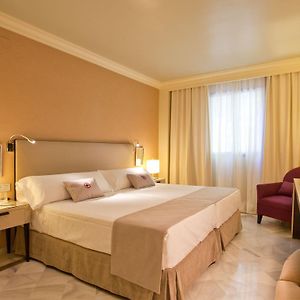 Habitación Comunicada con Cama Queen